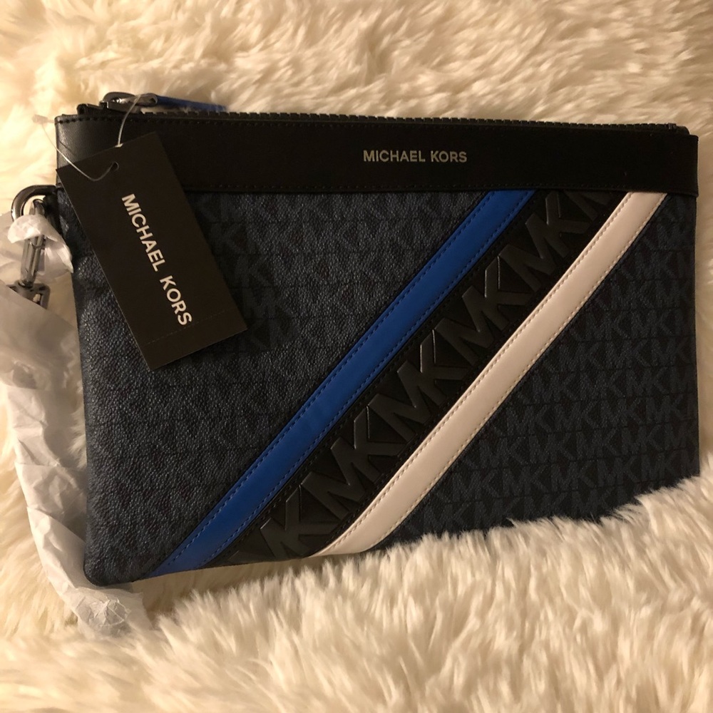 Black with blue and white lines MK wristlet.